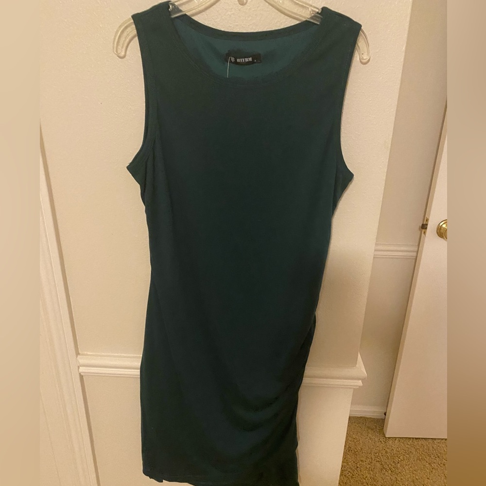BTFBM Emerald green, sleeveless jersey dress with ruched at bottom.